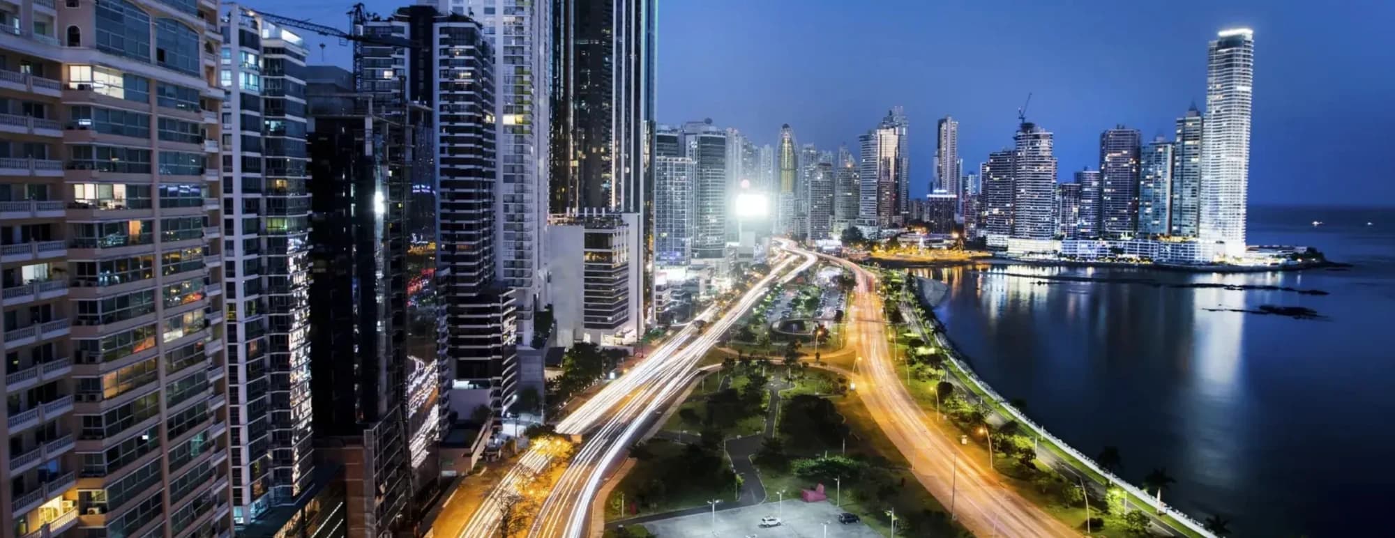 Panama City towers and the Cinta Costera coastal road at night