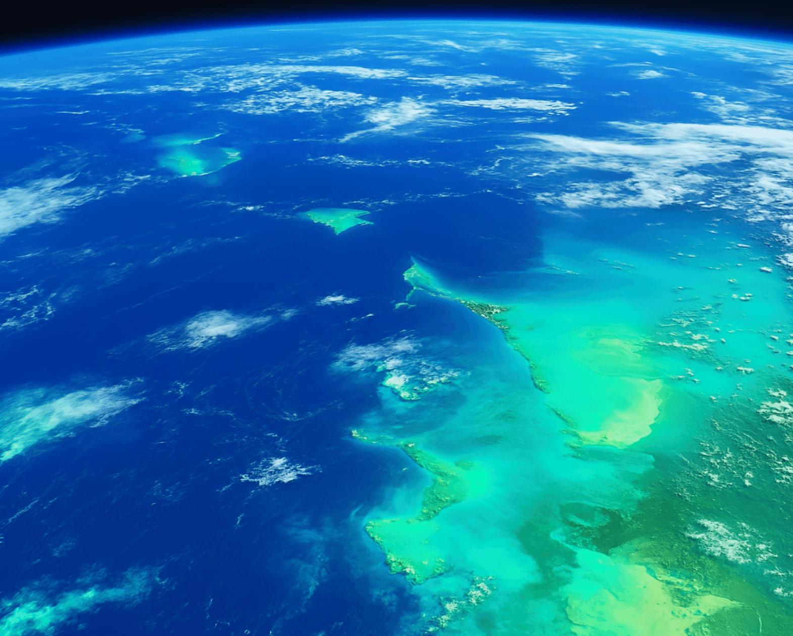 Earth from orbit above vivid blue ocean and turquoise islands